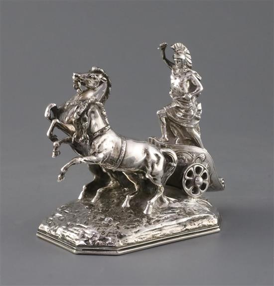A late 19th century Hanau silver miniature model of a Roman charioteer with two rearing horses, 18 oz.